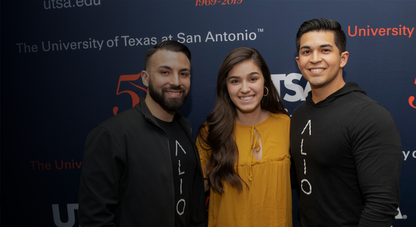 Three student posing for the camera